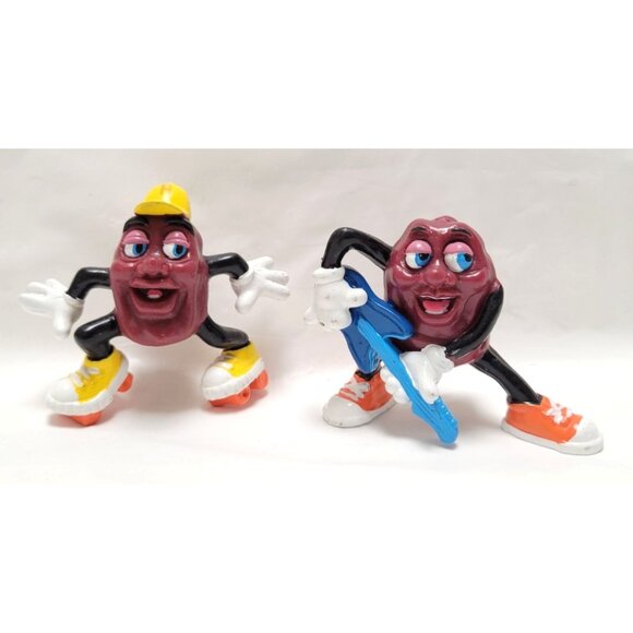Lot of 2 Vintage 1988 California Raisins PVC Figurines Roller Skates Guitar - Picture 1 of 6